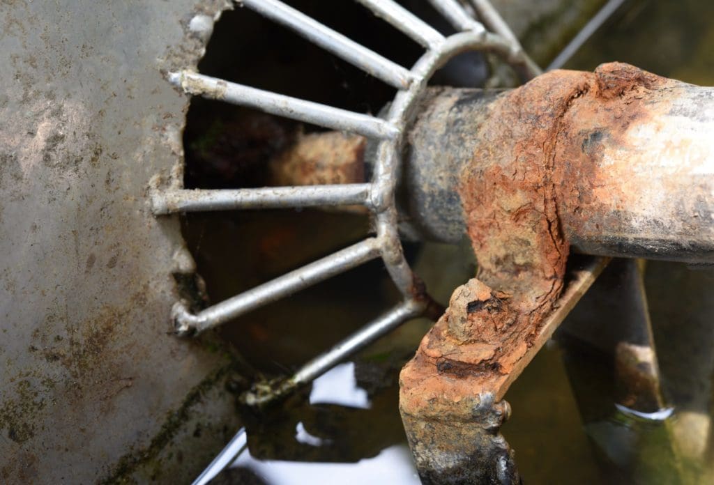 Corroded tractor part.